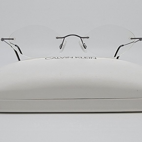 Calvin Klein 546 82 Gunmetal Rimless Eyeglasses Frame w/ Case Japan 48-19-135